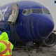 Illustration for article titled Rain Blamed for Plane Sliding off Runway at Hollywood Burbank Airport